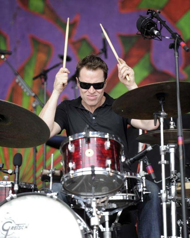 Galactic percussionist Stanton Moore drums along Sunday, April 27, 2014, during the New Orleans Jazz and Heratige Festival.