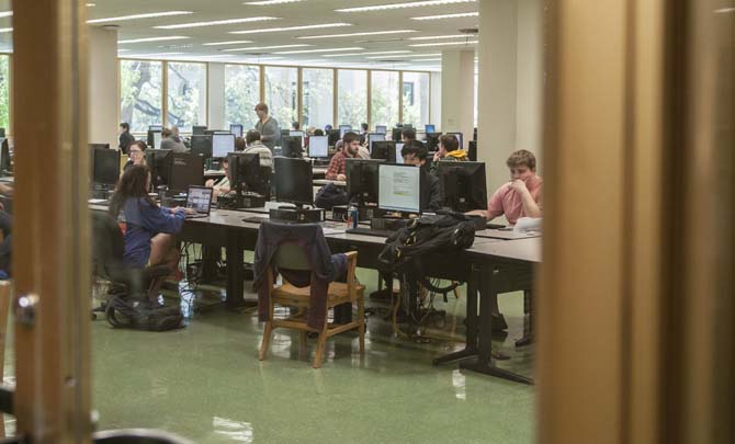 Students study Tuesday, March 25, 2014, on computers on the second floor of Middleton Library. After finals this semester, the second floor computer lab will be shut down.