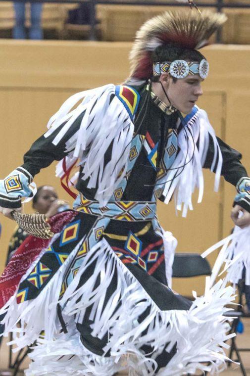 Sean McGovern performs a grass dance Saturday, April 5, 2014 during the 5th Annual LSU Native American Student Organization Spring Pow Wow held in Parker Coliseum.