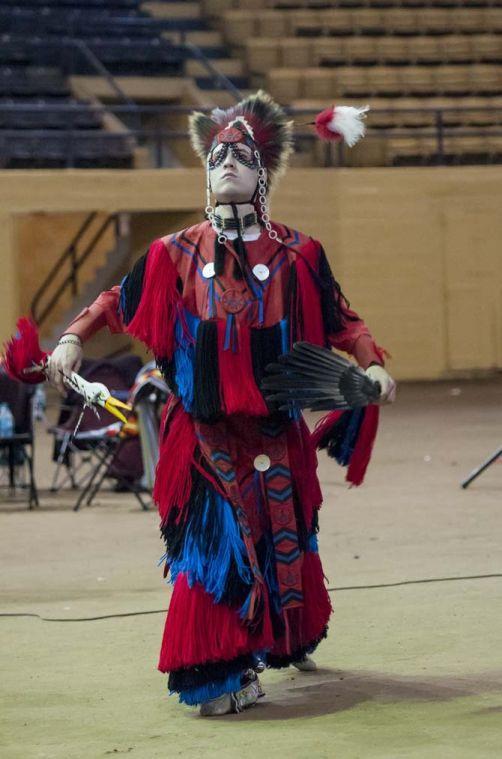 Citizen of the Potawatomi Nation Lyle Simmons dances Saturday, April 5, 2014 during the 5th Annual LSU Native American Student Organization Spring Pow Wow held in Parker Coliseum.