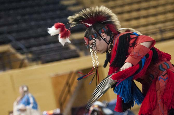 Citizen of the Potawatomi Nation Lyle Simmons dances Saturday, April 5, 2014 during the 5th Annual LSU Native American Student Organization Spring Pow Wow held in Parker Coliseum.