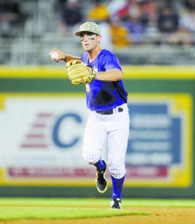 LSU sophomore infielder Alex Bregman (8) looks to throw to first Tuesday, April 22, 2014, during the Tigers' 6-0 win against Tulane in Alex Box Stadium.