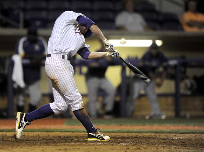 LSU sophomore outfielder Andrew Stevenson (6) swings at the ball Tuesday, April 29, 2014, during the Tigers' 9-7 victory against Alcorn in Alex Box Stadium.