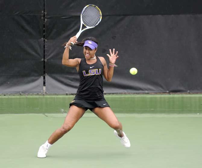 LSU junior Noel Scott hits the ball Sunday, April 6, 2014, during the Tigers' loss to Georgia.