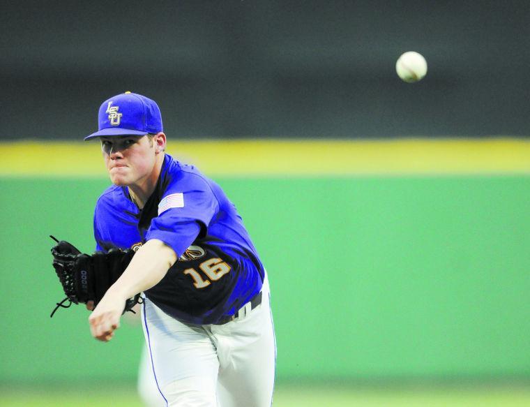 LSU freshman pitcher Jared Poche' (16) warms up between innings Saturday, Mach 22, 2014, during the Tigers' 2-1 win against Georgia in Alex Box Stadium.