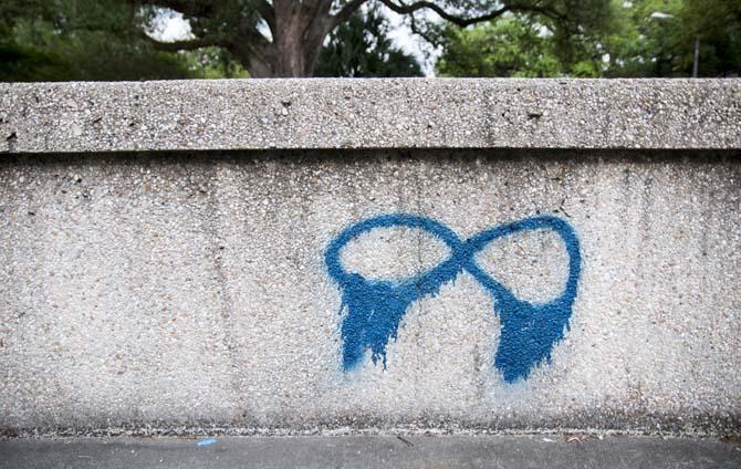 Graffiti has been written on the walls of free speech plaza.