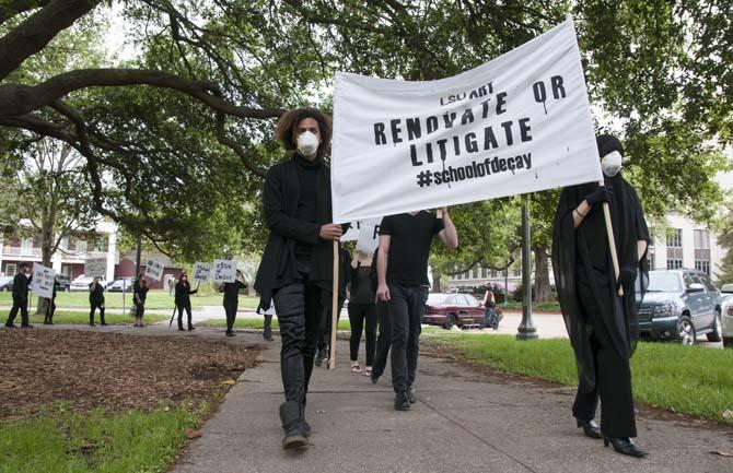 LSU School of Art &amp; Design students and supporters hold up signs in protest of the poor conditions in the Studio Arts Building on Tuesday, April 8, 2014, in front of the Louisiana State Capitol.