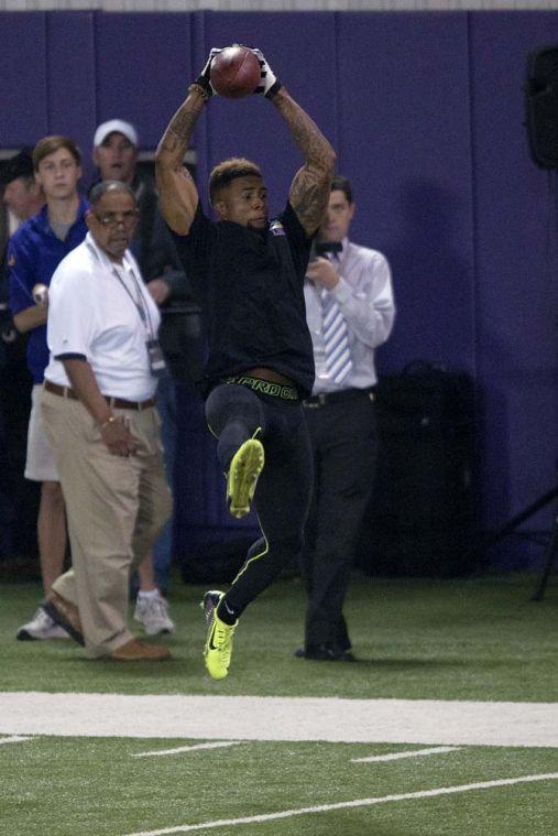 LSU junior wide receiver Odell Beckham Jr. (3) catches a pass on Wednesday, April 9, 2014 during LSU Pro Day in the LSU Indoor Practice Facility.