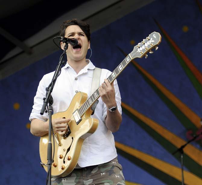 Ezra Koenig of Vampire Weekend sings Sunday, April 26, 2014, during the New Orleans Jazz and Heratige Festival.