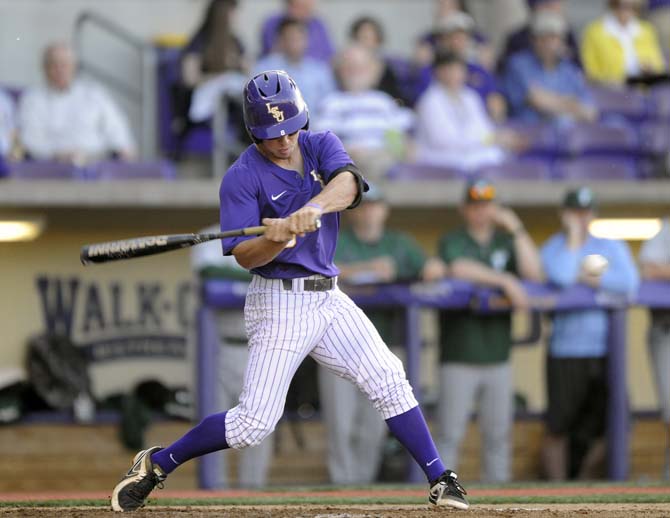 LSU sophomore infielder Alex Bregman (8) hits the ball Tuesday, April 22, 2014, during the Tigers' 6-0 win against Tulane in Alex Box Stadium.