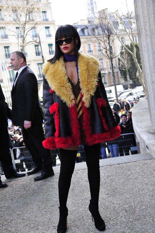 FILE - This March 5, 2014 file photo shows singer Rihanna arriving at Miu Miu's ready to wear fall/winter 2014-2015 fashion collection presented in Paris. The Council of Fashion Designers of America, Inc. announced Monday, March 24, 2014, that the 26-year-old pop star will receive at the CFDA Fashion Icon Award on June 2 in New York City. (AP Photo/Zacharie Scheurer, File)