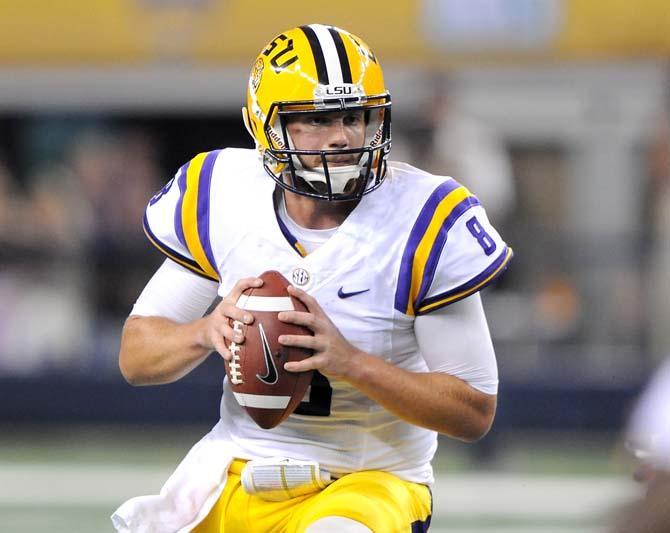 LSU senior quarterback Zach Mettenberger (8) looks downfield for a receiver Sept. 7, 2013 during the Tigers' 56-17 victory against UAB in Tiger Stadium.