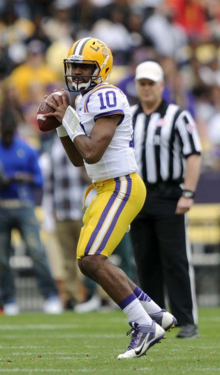 LSU sophomore quarterback Anthony Jennings (10) passes the ball Saturday, April 5, 2014 during the white squad's 42-14 victory against the purple squad in the National L Club Spring Game in Tiger Stadium.