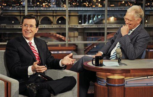 In this May 3, 2012 photo provided by CBS, Stephen Colbert, left, host of the &#8220;Colbert Report&#8221; on the Comedy Central Network, has a laugh on stage with host David Letterman on the set of the &#8220;Late Show with David Letterman,&#8221; in New York. CBS announced on Thursday, April 10, 2014 that Colbert will replace Letterman as &#8220;Late Show&#8221; host after Letterman retires in 2015. (AP Photo/CBS, John Paul Filo) MANDATORY CREDIT, NO SALES, NO ARCHIVE, FOR NORTH AMERICAN USE ONLY