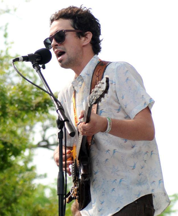 Guitarist Mario Matteoli from The Preservation sings to the crowd Saturday, April 26, 2014 at the annual Festival International de Louisiane in Downtown Lafayette.