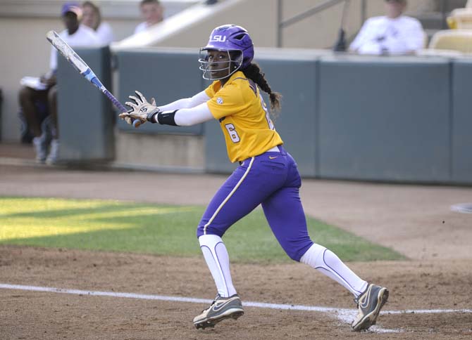 LSU junior outfielder A.J. Andrews hits the ball Wednesday, April 23, 2014 during the Lady Tigers' 6-1 victory against the University of South Alabama at Tiger Park.