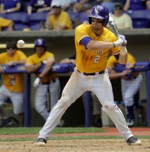 LSU junior catcher Tyler Moore (2) prepares to swing at the ball Sunday, April 27, 2014, during the Tigers' 9-4 victory against Tennessee in Alex Box Stadium.