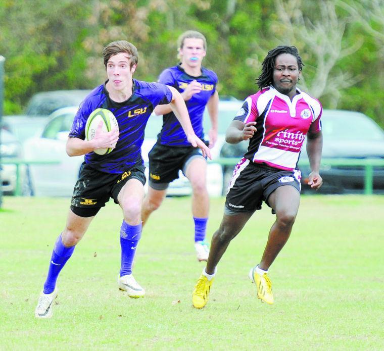 LSU fly half Daniel Dowd (10) runs downfield Saturday, Feb. 22, 2014 during the Tigers' 75-5 win against Mississippi State at Highland Road Community Park.