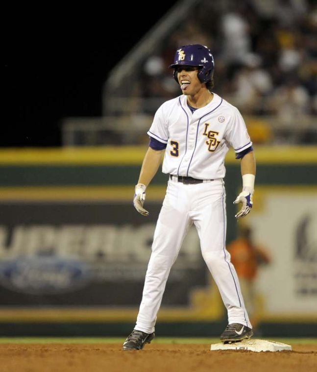 LSU freshman infielder Kramer Robertson (3) celebrates after a double Friday, April 25, 2014 during the Tigers' 8-7 victory against Tennessee at Alex Box Stadium.