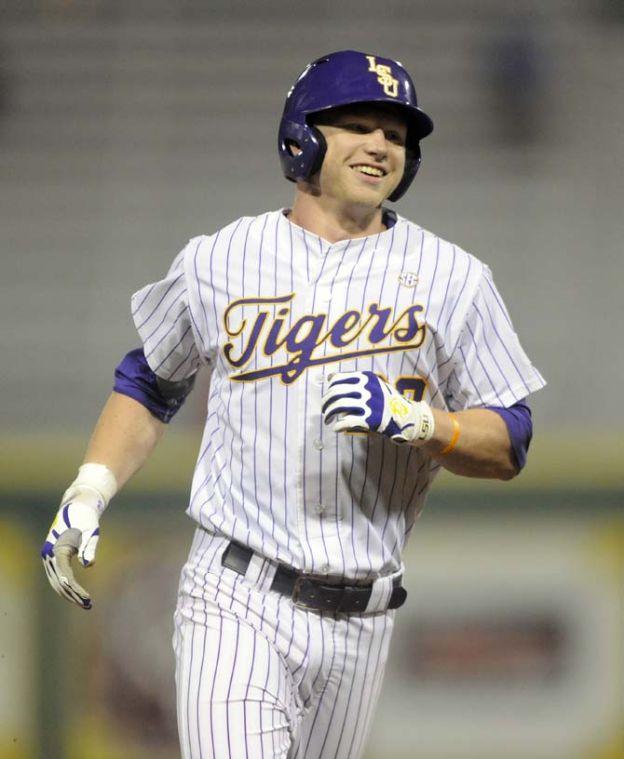 LSU freshman outfielder Jake Fraley (23) crosses third base to score a homerun Tuesday, April 29, 2014, during the Tigers' 9-7 victory against Alcorn in Alex Box Stadium.