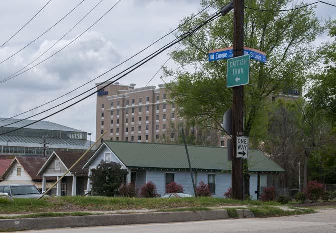 A sign pointing to Catfish Town still remains on St. Louis Street, even though most of the area has since been demolished for businesses.