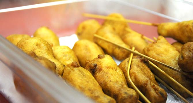 Deep fried hot wings on sticks rest in a container waiting to be served Saturday, April 26, 2014 during the first annual Louisiana Wing-a-thon at the Baton Rouge River Center.