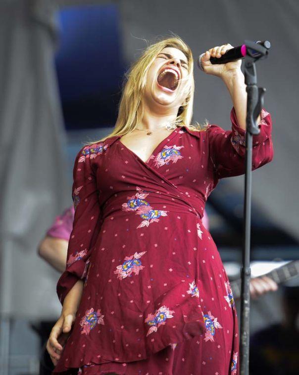 Maggie Koerner screams into the microphone while playing with Galactic on Sunday, April 27, 2014 during the New Orleans Jazz and Heritage Festival.