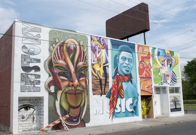 A mural covers the wall of the abandoned Lincoln Theater in Old South Baton Rouge.