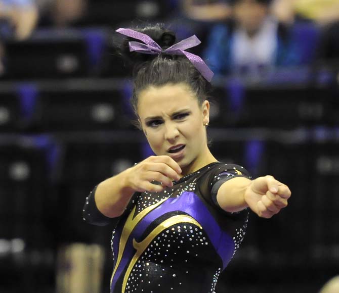 LSU junior all-around Rheagan Courville performs her floor routine Saturday, April 5, 2014, during an NCAA Gymnastics Regional meet in the PMAC. The Tigers won the meet with a school-record score of 198.325.