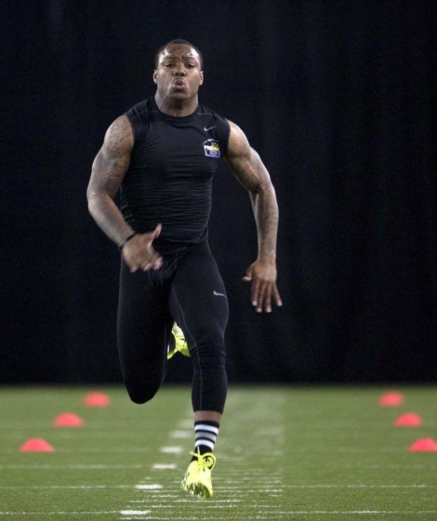 LSU sophomore running back Jeremy Hill (33) completes the 40 yard dash on Wednesday, April 9, 2014 in the LSU Indoor Practice Facility.