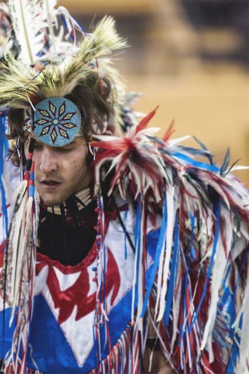 Casey Murphy performs a grass dance Saturday, April 5, 2014 during the 5th Annual LSU Native American Student Organization Spring Pow Wow held in Parker Coliseum.