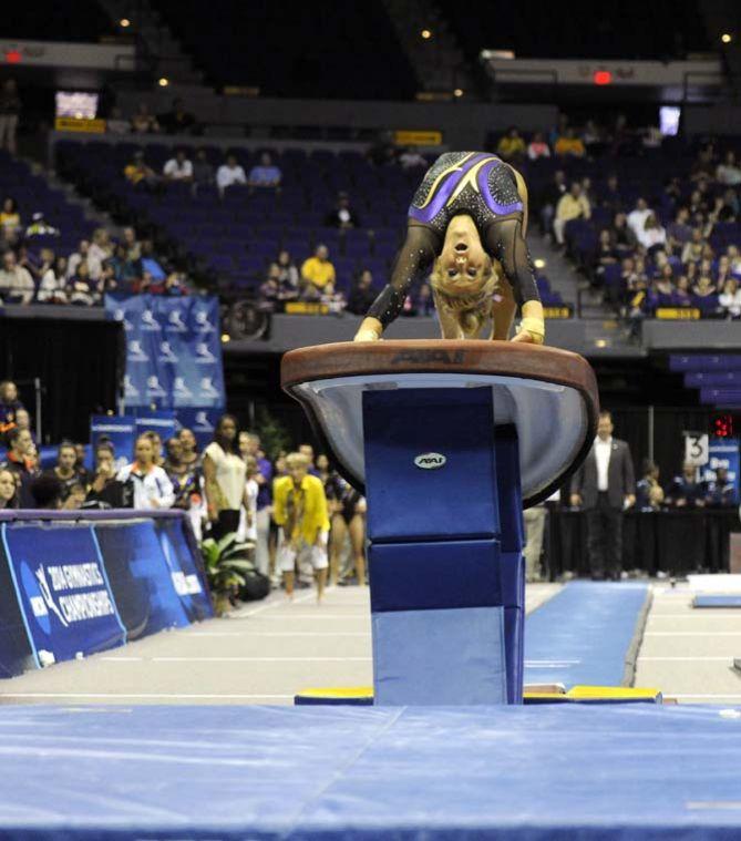 LSU senior all-around Sarie Morrison flips over the vault Saturday, April 5, 2014, during an NCAA Gymnastics Regional meet in the PMAC. The Tigers won the meet with a school-record 198.325.