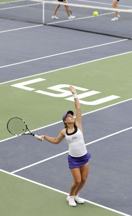 LSU sophomore Ella Taylor serves the ball Wednesday, April 2, 2014 during a match against Tulane in W.T. "Dub" Robinson Stadium.