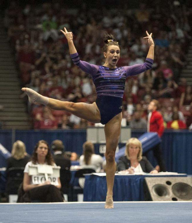 LSU junior all-around gymnast Rheagan Courville performs her floor routine Saturday, April 19, 2014 during the fourth rotation of the NCAA Super Six Finals in Birmingham, Ala.