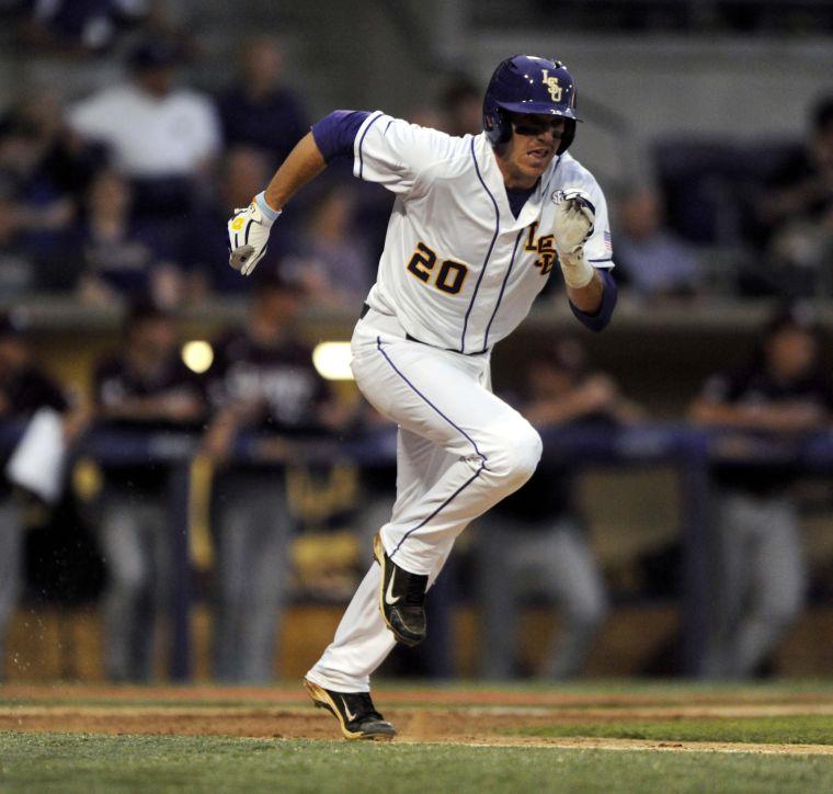 LSU junior infielder Conner Hale (20) runs to first base during the Tigers' 3-0 victory against Mississippi State on Friday, April 4, 2014 at Alex Box Stadium.