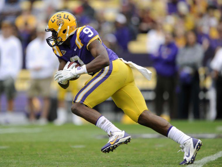 LSU freshman wide receiver John Diarse (9) runs with the ball Saturday, April 5, 2014 during the white squad's 42-14 victory against the purple squad in the National L Club Spring Game in Tiger Stadium.