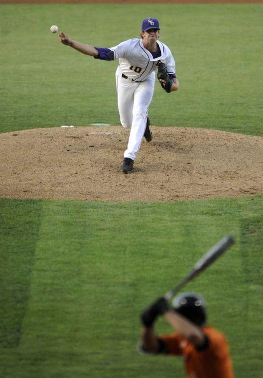 LSU junior pitcher Aaron Nola (10) pitches to a Tennessee hitter Friday, April 25, 2014 during the Tigers' 8-7 victory against Tennessee at Alex Box Stadium.