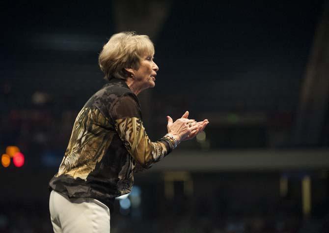 LSU gymnastics head coach D-D Breaux cheers for her team Saturday, April 19, 2014 during the second rotation of the NCAA Super Six Finals in Birmingham, Ala.