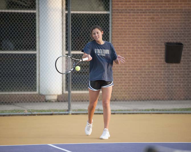 LSU civil engineering junior Jamie Hamilton practices Monday, April 7, 2014 in preparation for the Tennis Club going to Nationals.