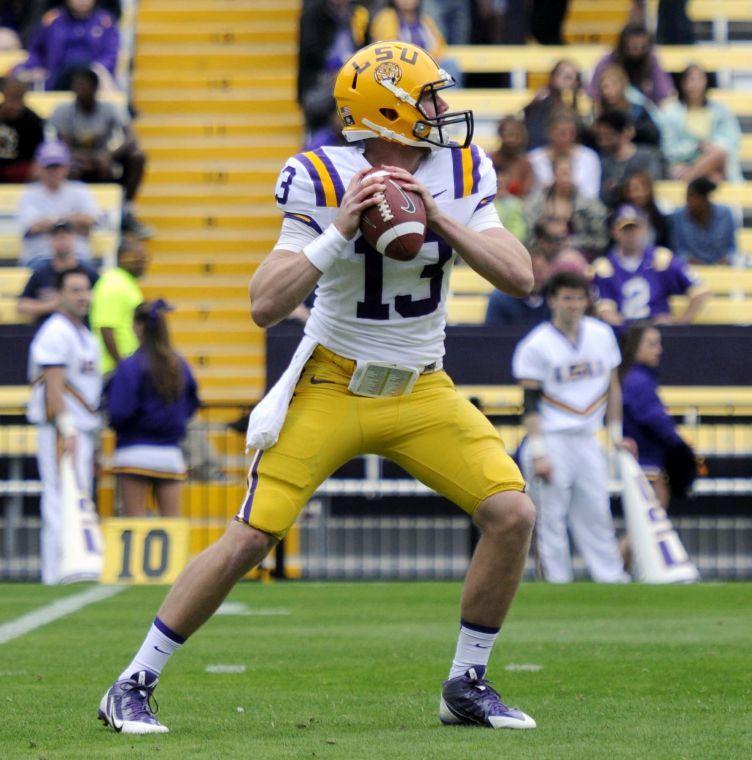 LSU freshman quarterback Jake Clise (13) prepares to throw the ball Saturday, April 5, 2014 during the white squad's 42-14 victory against the purple squad in the National L Club Spring Game in Tiger Stadium.