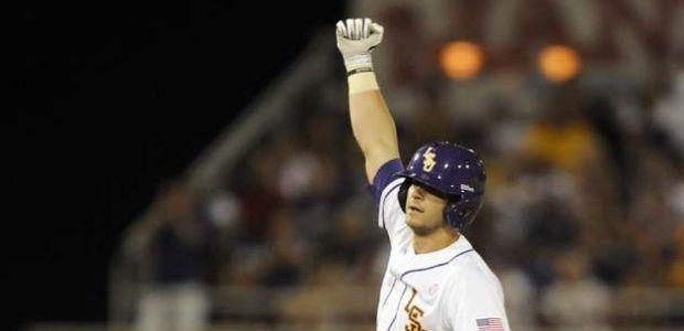 LSU junior catcher Tyler Moore (2) celebrates after a double Friday, April 25, 2014 during the Tigers' 8-7 victory against Tennessee at Alex Box Stadium.