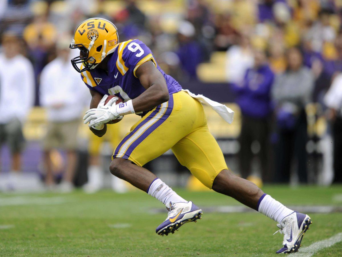 LSU freshman wide receiver John Diarse (9) runs with the ball Saturday, April 5, 2014 during the white squad's 42-14 victory against the purple squad in the National L Club Spring Game in Tiger Stadium.