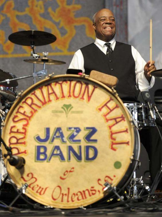 Joseph Latiste Jr. of the Preservation Hall Jazz Band plays the drums Sunday, April 27, 2014, during the New Orleans Jazz and Heritage Festival.