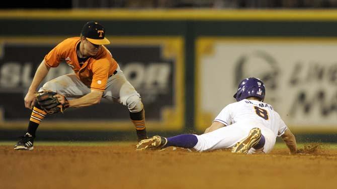 LSU sophomore infielder Alex Bregman (8) slides safely into second Friday, April 25, 2014 during the Tigers' 8-7 victory against Tennessee at Alex Box Stadium.