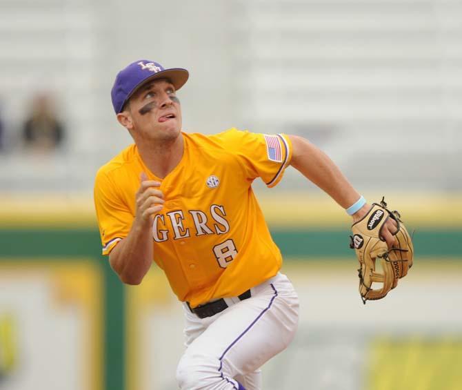 LSU sophomore infielder Alex Bregman (8) runs after a potential foul ball Sunday, April 6, 2014 during the Tigers' 17-4 victory against Mississppi State at Alex Box Stadium.