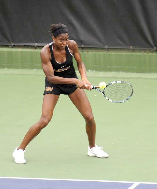 LSU freshman Skylar Holloway hits the ball Sunday, April 6, 2014, during the Tigers' loss to Georgia in W.T. "Dub" Robinson Stadium.