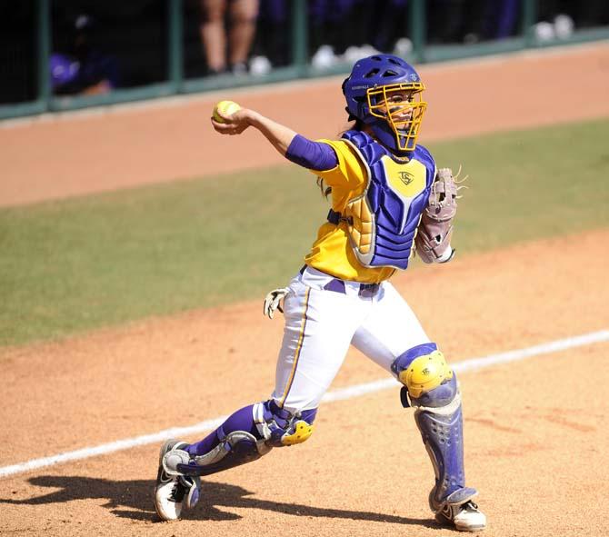 LSU freshman catcher Sahvanna Jaquish (2) fires to first Sunday, Feb. 9, 2014 during the Lady Tigers' 8-1 victory against Central Arkansas at Tiger Park.