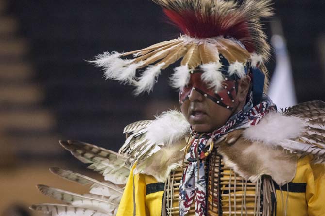 Head Man Cocoa Creppel dances Saturday, April 5, 2014 during the 5th Annual LSU Native American Student Organization Spring Pow Wow held in Parker Coliseum.