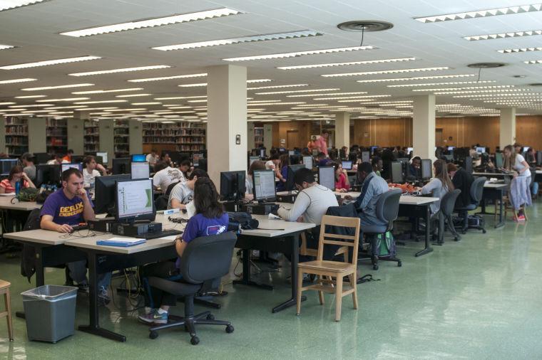 Students studyn Tuesday, March 25, 2014, on computers on the second floor of Middleton Library. After finals this semester, the second floor computer lab will be shut down.