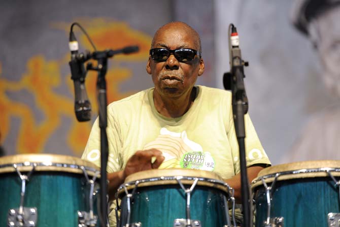 A member of John Mooney and Bluesiana plays Saturday, April 26, 2014, during the New Orleans Jazz and Heratige Festival.